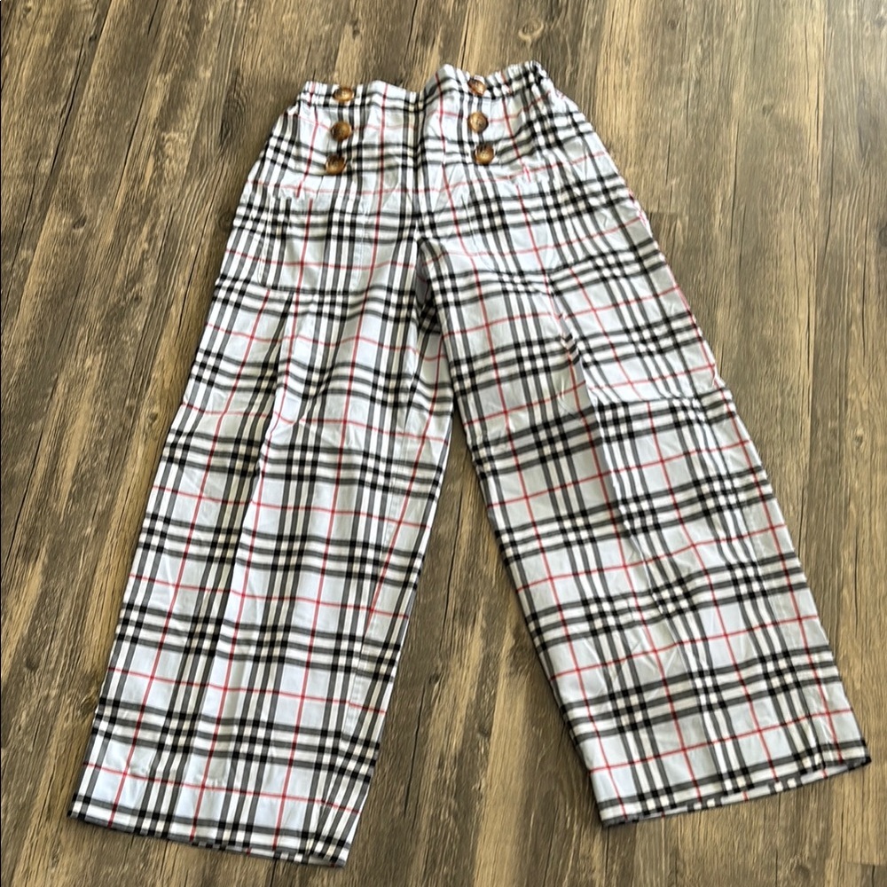 Young woman’s Burberry Plaid Ankle Pants - Black, White, Red